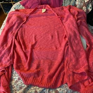 Peach colored cardigan